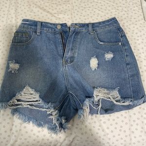 Distressed ripped jean shorts